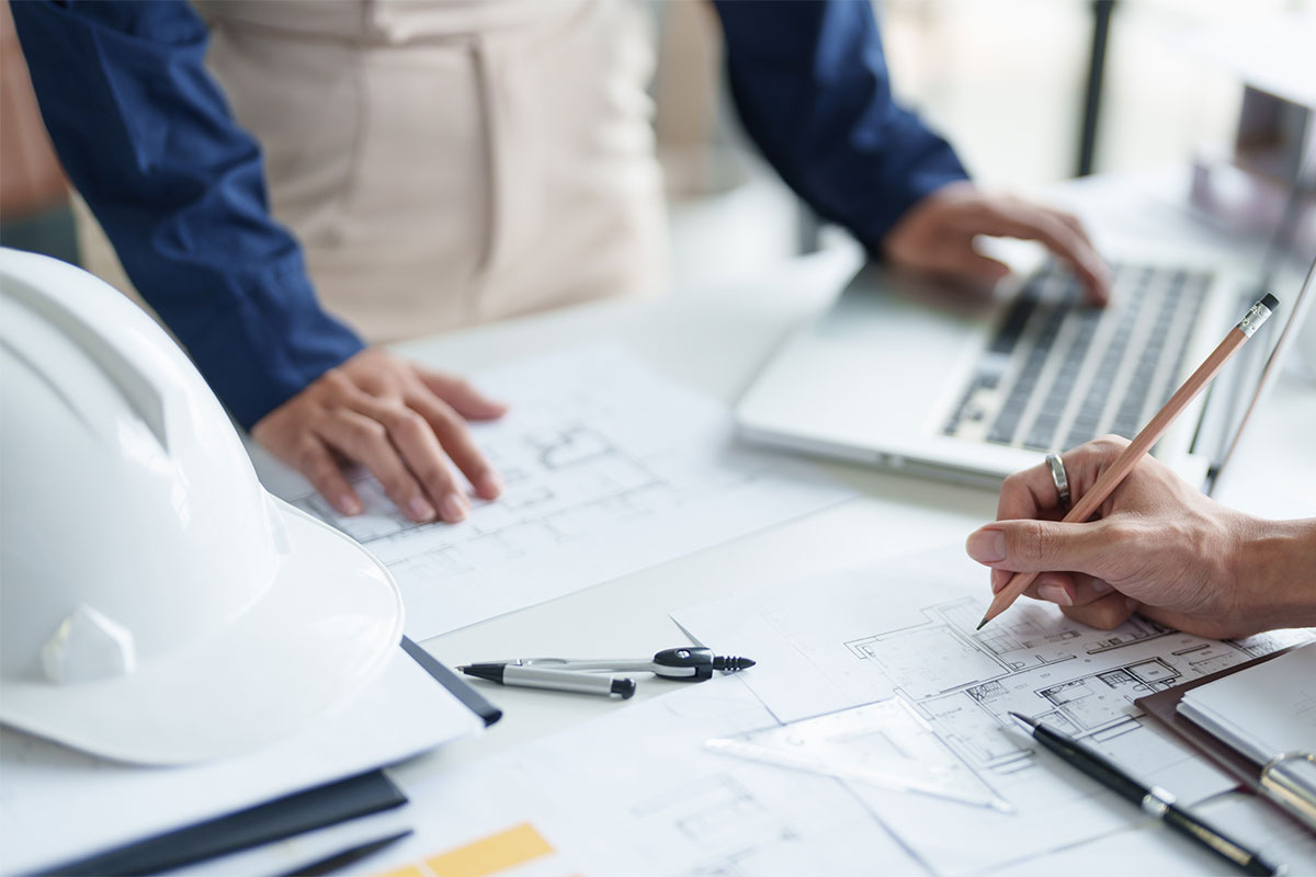 residential contractor in Asheville discussing building plans